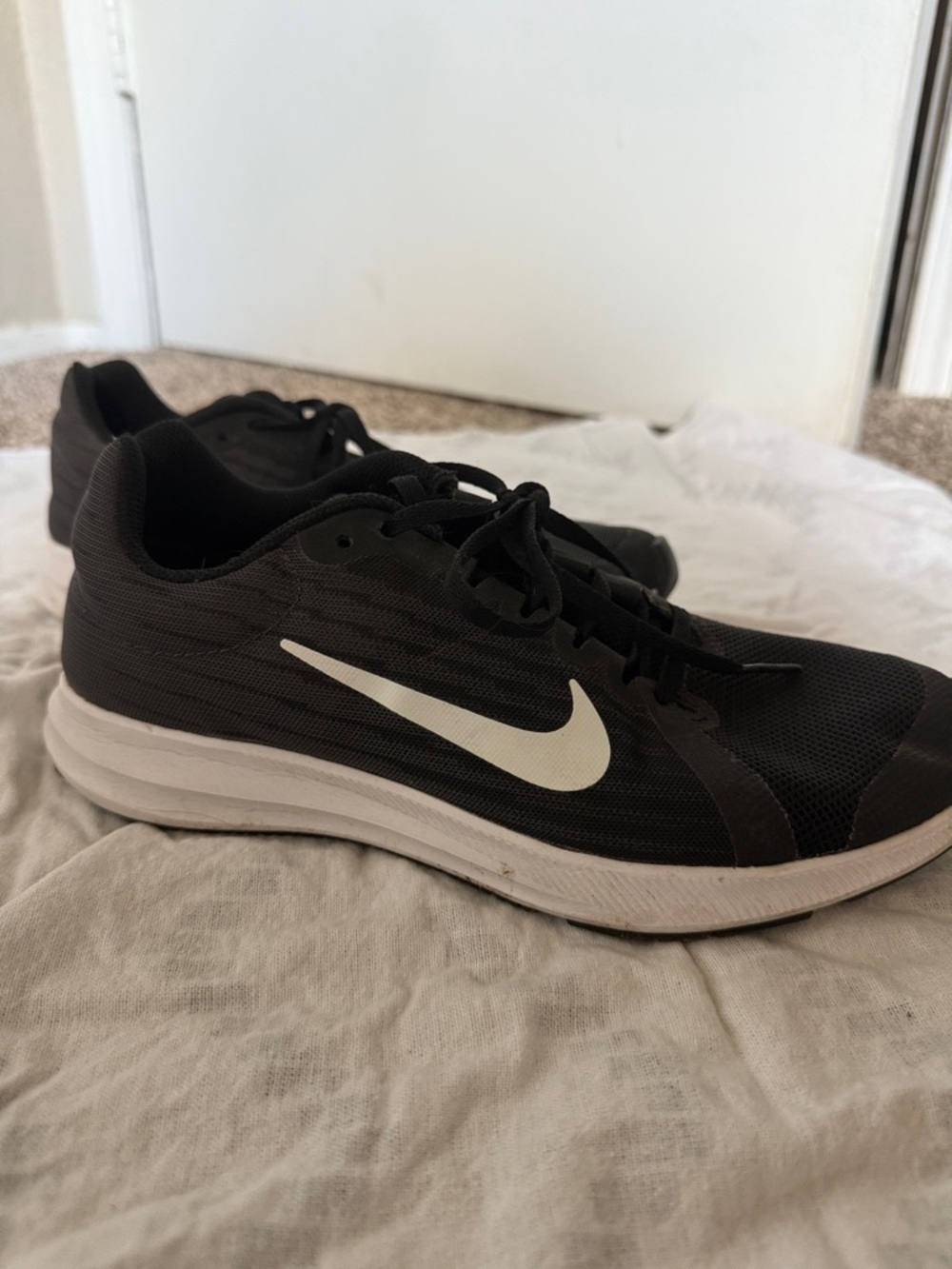 Nike Black Sneakers with White Swoosh